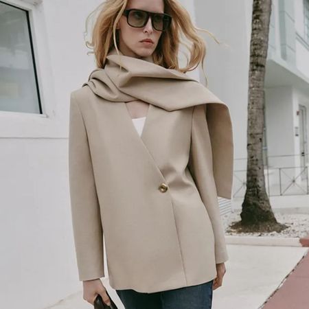 Woman in a scarf blazer