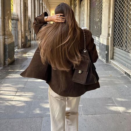 French woman with a Chanel 25 bag