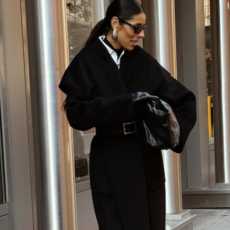 woman wearing statement coat outfit 2026